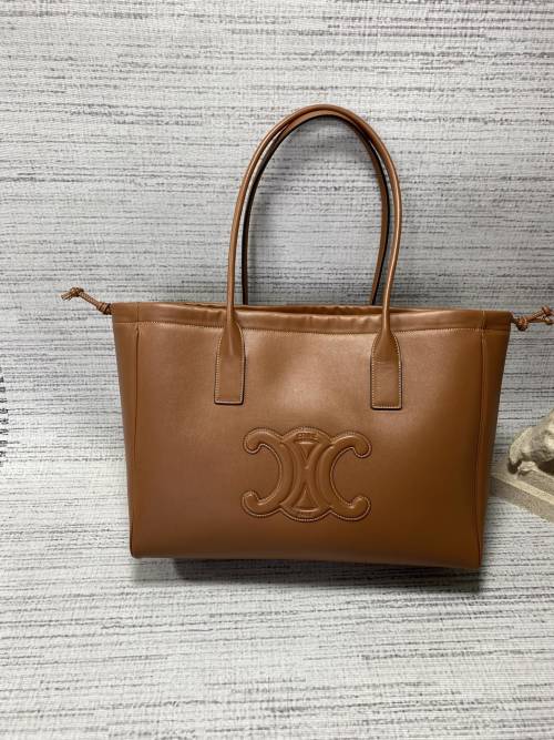 Celine Cabas Triomphe Drawstring Tote Bag in Tan Leather, 44 x 28 x 18 cm 1 Celine Cabas Triomphe Drawstring Tote Bag in Tan Leather, 44 x 28 x 18 cm