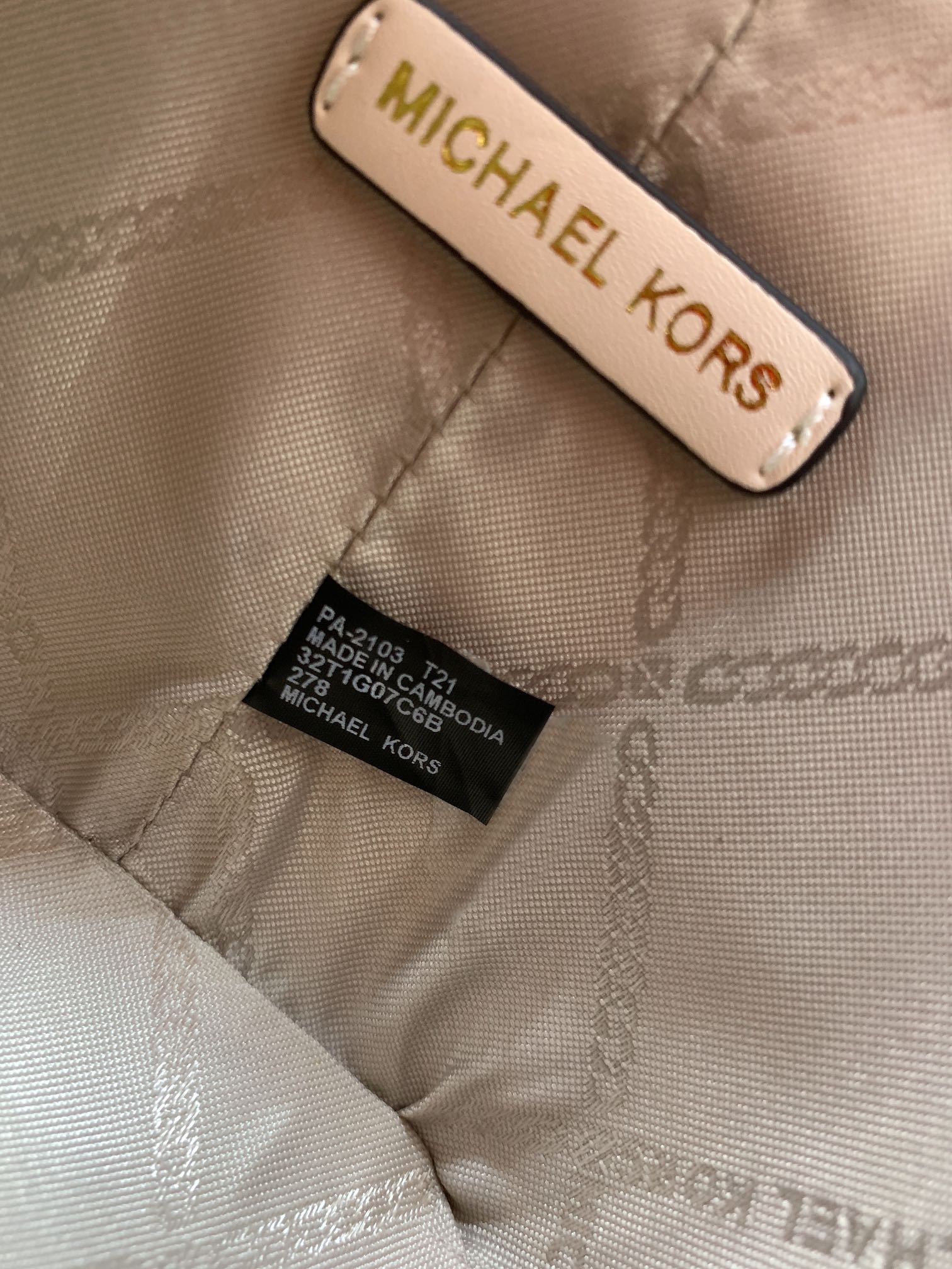 Michael Kors ～此款小圆筒彩色涂鸦手提斜挎包造型特别独特