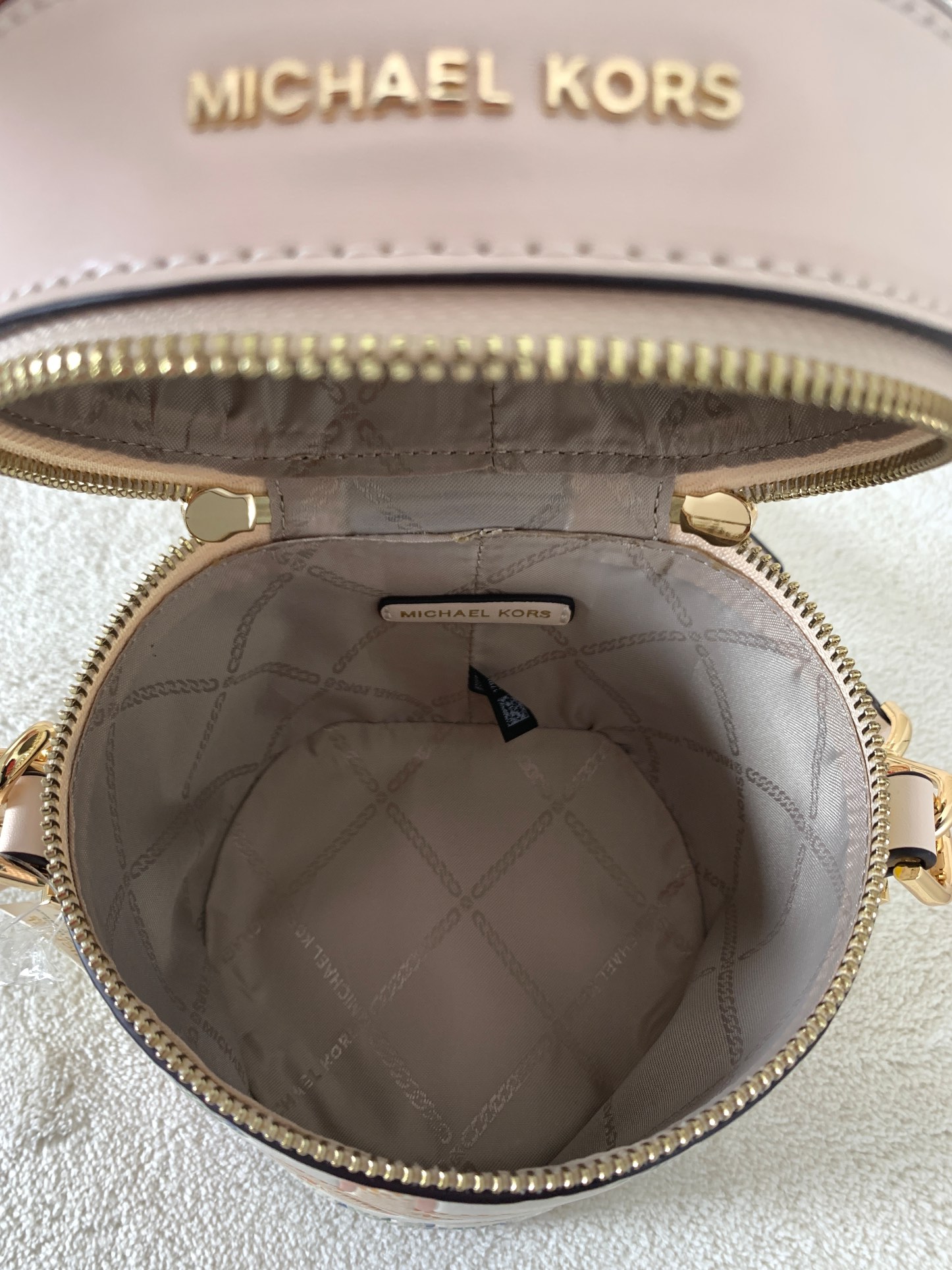 Michael Kors ～此款小圆筒彩色涂鸦手提斜挎包造型特别独特