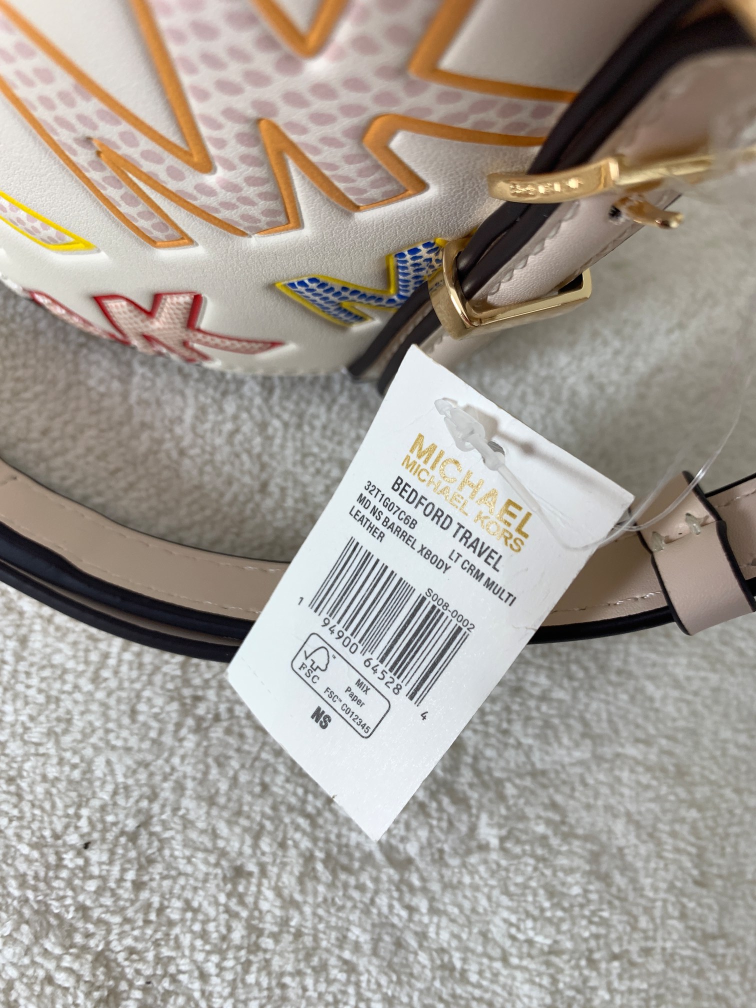 Michael Kors ～此款小圆筒彩色涂鸦手提斜挎包造型特别独特