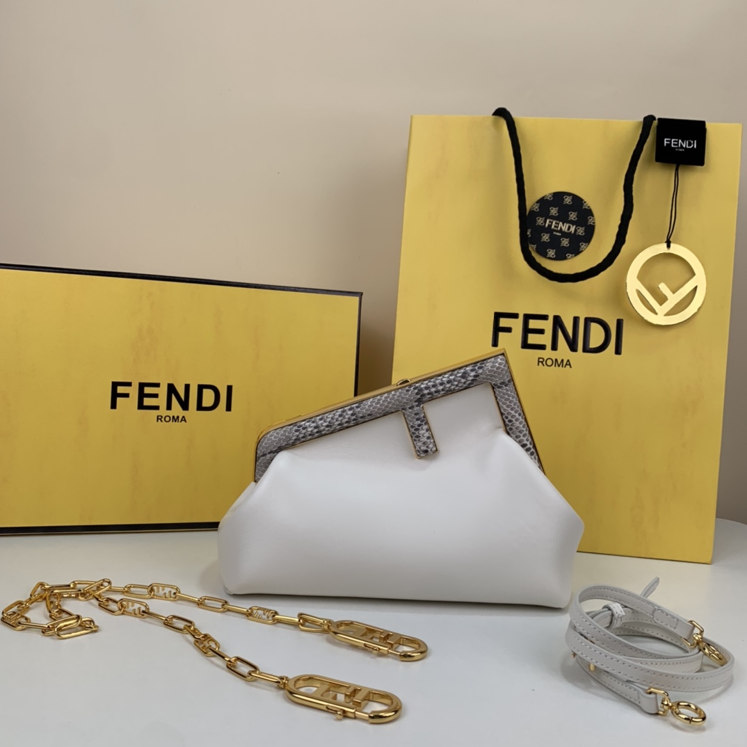 In stock ✔️ Hot item - Fendi First, love it! All so beautiful, must have 💫💫💫 Note: Chain ⛓️ sold separately ☘️☘️☘️ F-shaped design, cloud-shaped bag, timeless texture and elements. White lambskin with snakeskin feel, super soft. Classic monogram interior. Can be handheld or crossbody, exudes luxury. Looks great any way you wear it, very versatile and stylish. Model 8B127. Size: 26 x 18 x 9.5 cm. image 1