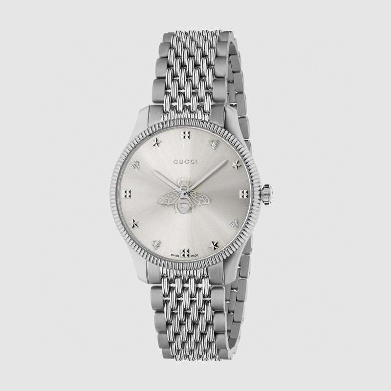 NO:388841,Batch: Original box: 30 Gucci GUCCI New model This classic stainless steel watch belongs to the G-Timeless series, adopts a classic sensual design, a fusion of sun ray textured dial, and a cleverly designed bee pattern seconds hand. Steel case, bee seconds hand with star silver sun ray textured dial, 9-chain link stainless steel bracelet Waterproof level 5 ATM Diameter: 36mm,,gucci,gucci19860909批: 原盒:30古驰 GUCCI 新款新款这款经典精钢腕表属于G-Timeless系列,采用经典感性设计,融合太阳射线纹理表盘,以及巧妙设计的蜜蜂图案秒针. 精钢表壳,饰蜜蜂秒针星星银色太阳射线纹理表盘,9链节精钢表链 防水级别5 ATM 直径:36mm,,gucci,gucci,Watch