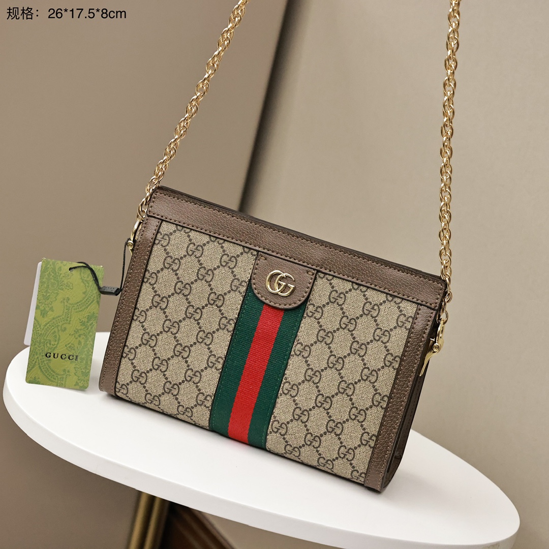 GUCCI Ophidia链条包💰220 
采用GGsupreme高级人造帆布，复古又经典，
构造简约加上经典双G印花搭配，标志性条纹织带，
原版五金链条，斜挎手拿随时转换，深受好评百搭。
规格：26*17.5*8cm