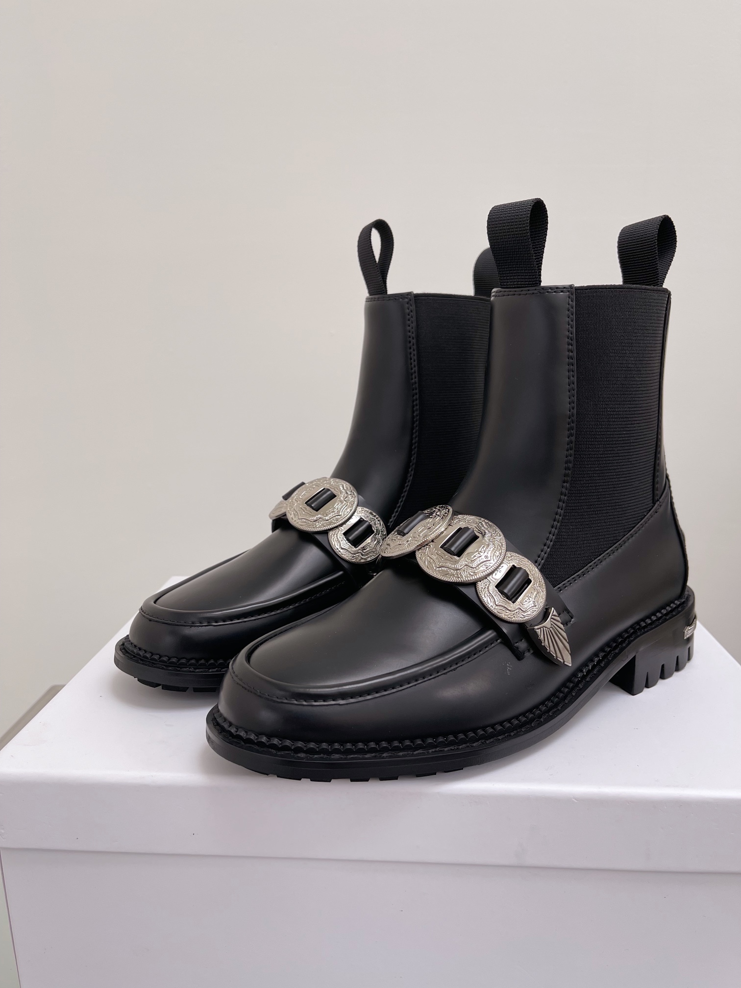 Unique Toga’ Leather Boots with Metal-Sensor Heel and Decorative Details