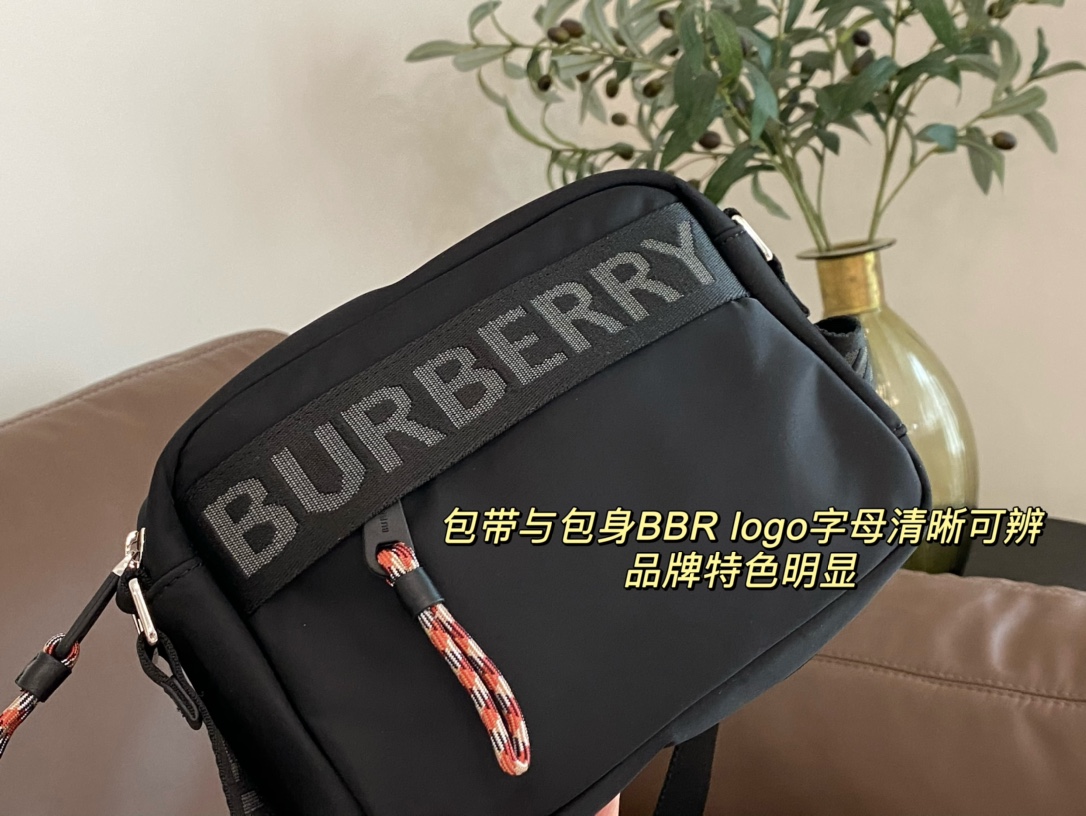 Camera bag silhouette featuring prominent Burberry lettering across the - Comprehensive