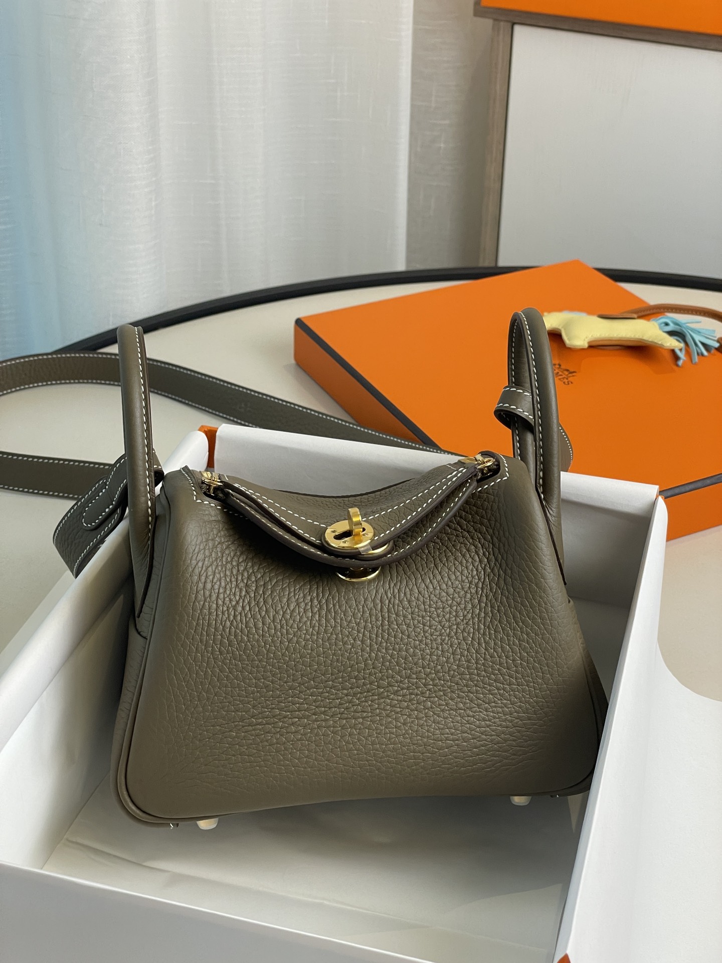 Where to buy fakes
 Hermes Lindy Crossbody & Shoulder Bags Elephant Grey Gold Hardware Mini