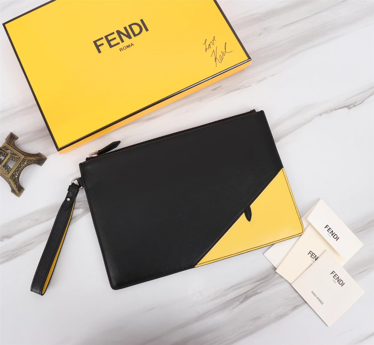 Every Designer
 Fendi Clutches & Pouch Bags Black Lemon Yellow Sewing Cowhide Pouch