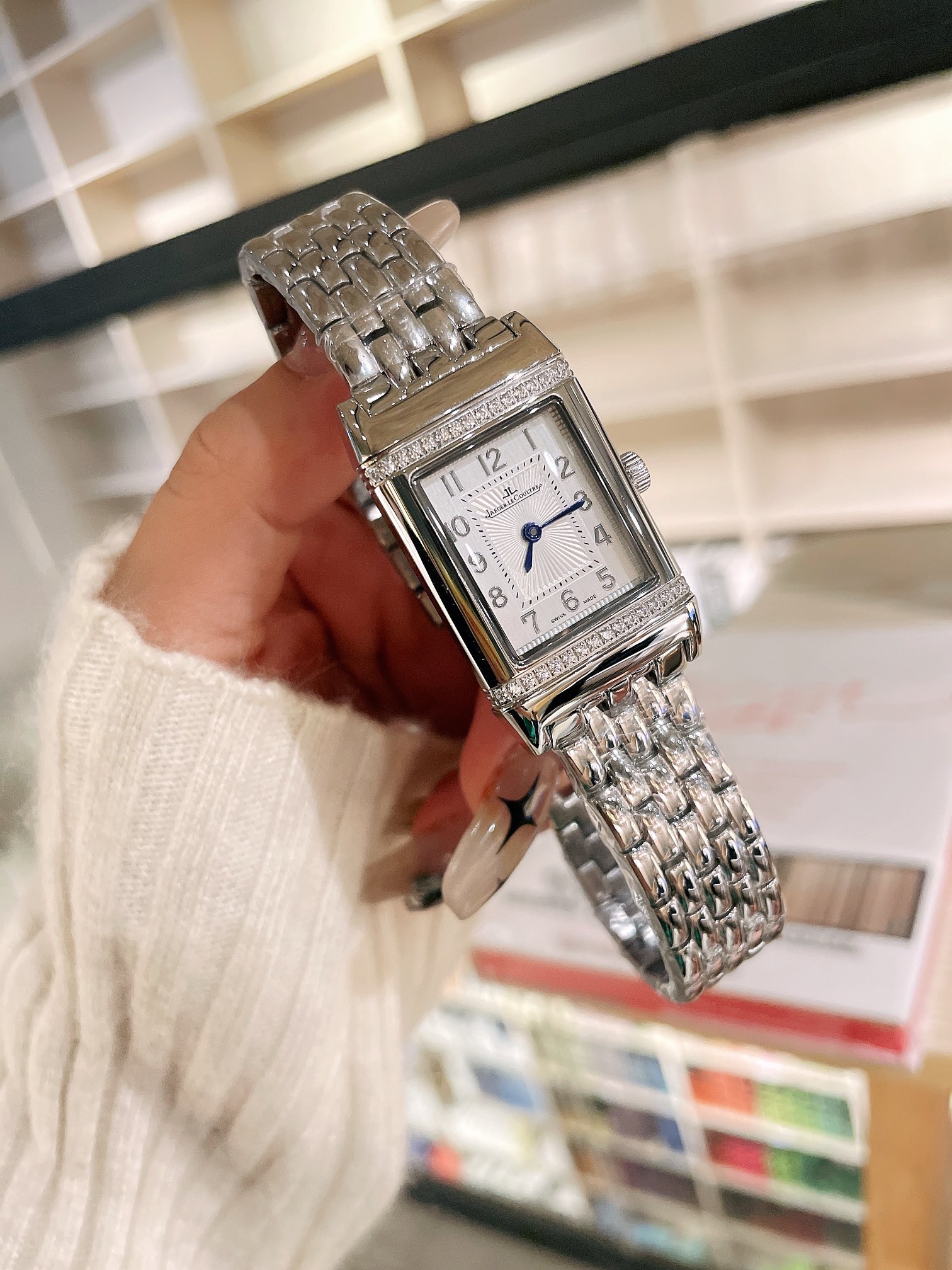 High-Level Women’s Wristwatch: White Leather, Gold Accents, Steel Belt Rotation