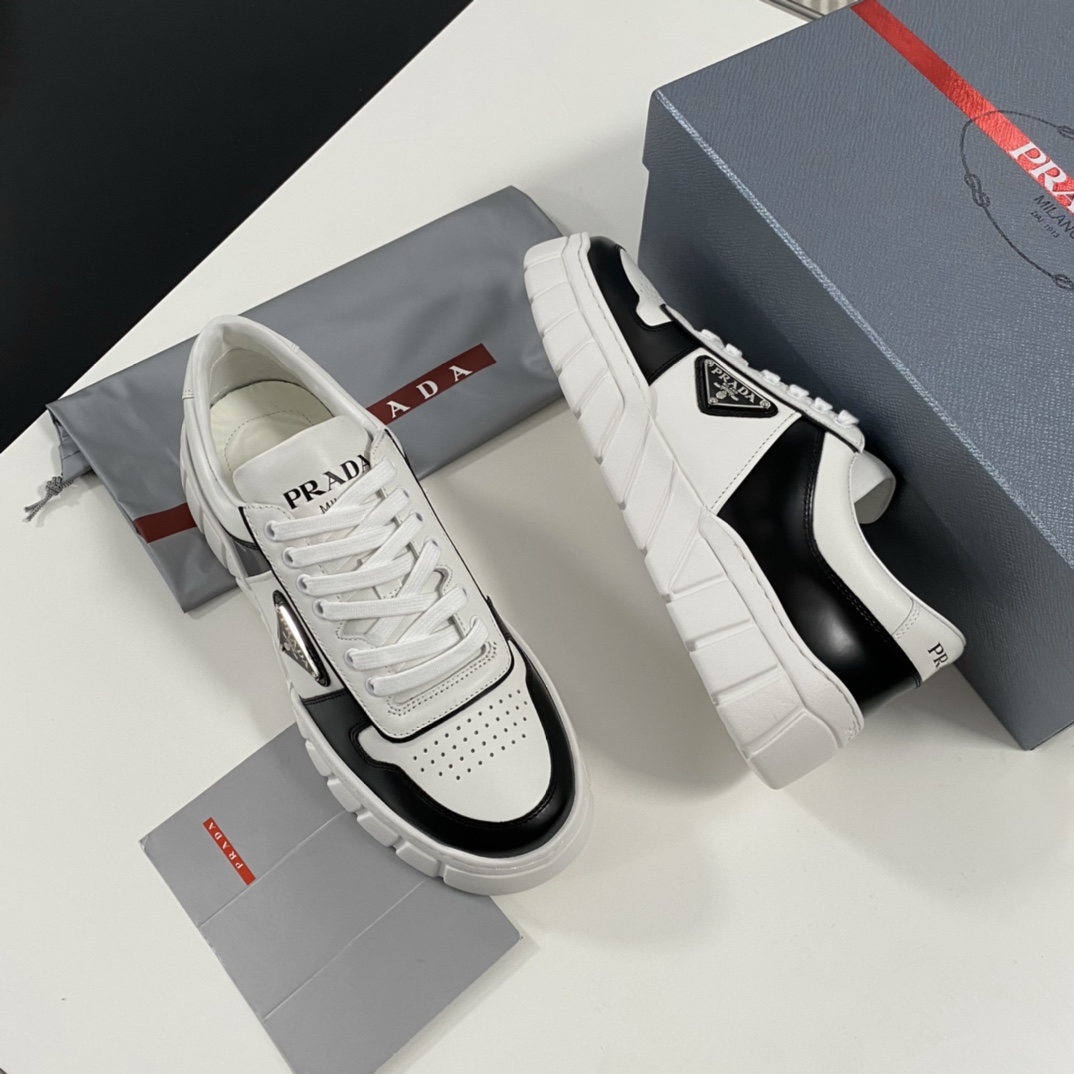 2025 PRAD * FLY BLOCK Leather Sneakers This gorgeous leather sneaker interprets