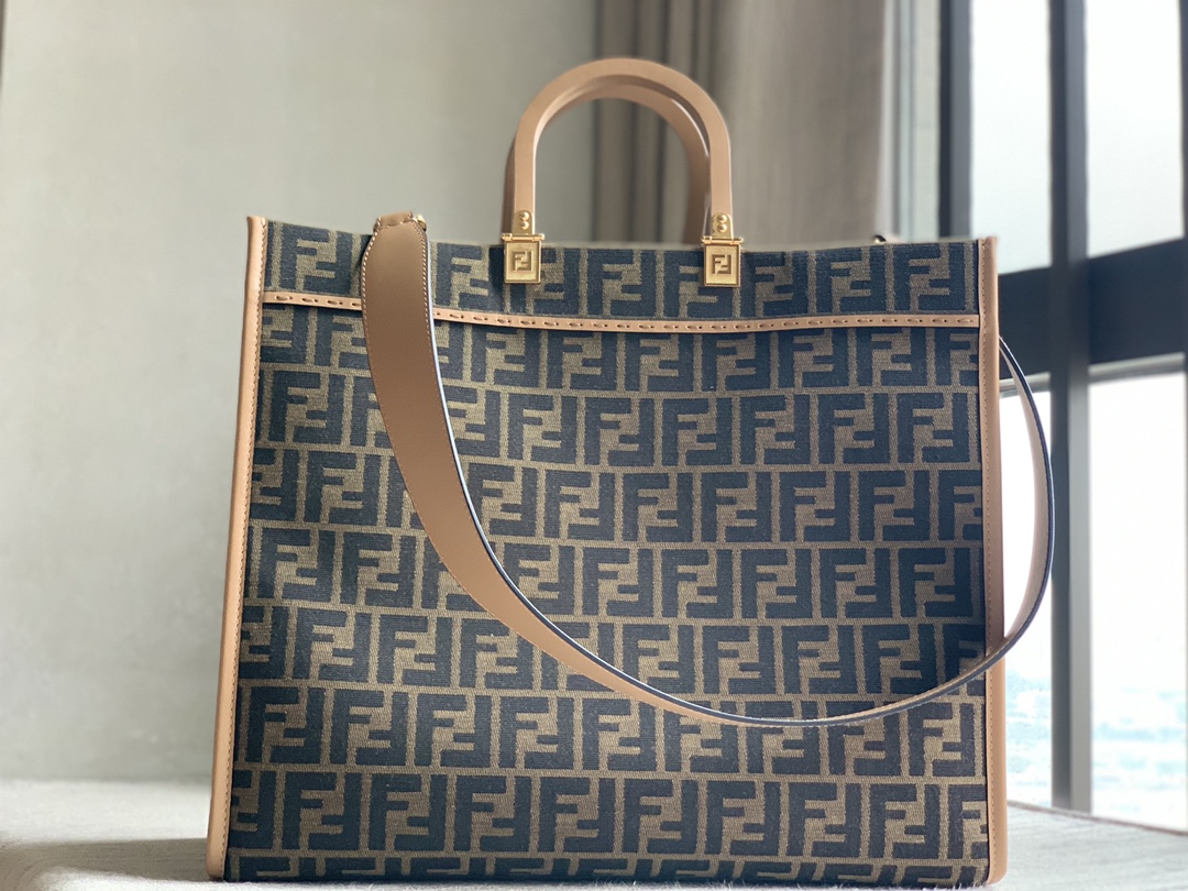 24New Arrival Sunshine fabric tote bag printed with brown FF jacquard pattern and light brown leather FENDI ROMA lettering, with hard leather han