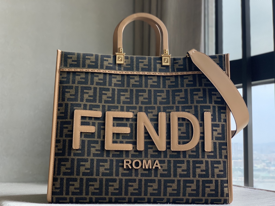 24New Arrival Sunshine fabric tote bag printed with brown FF jacquard pattern and light brown leather FENDI ROMA lettering, with hard leather han