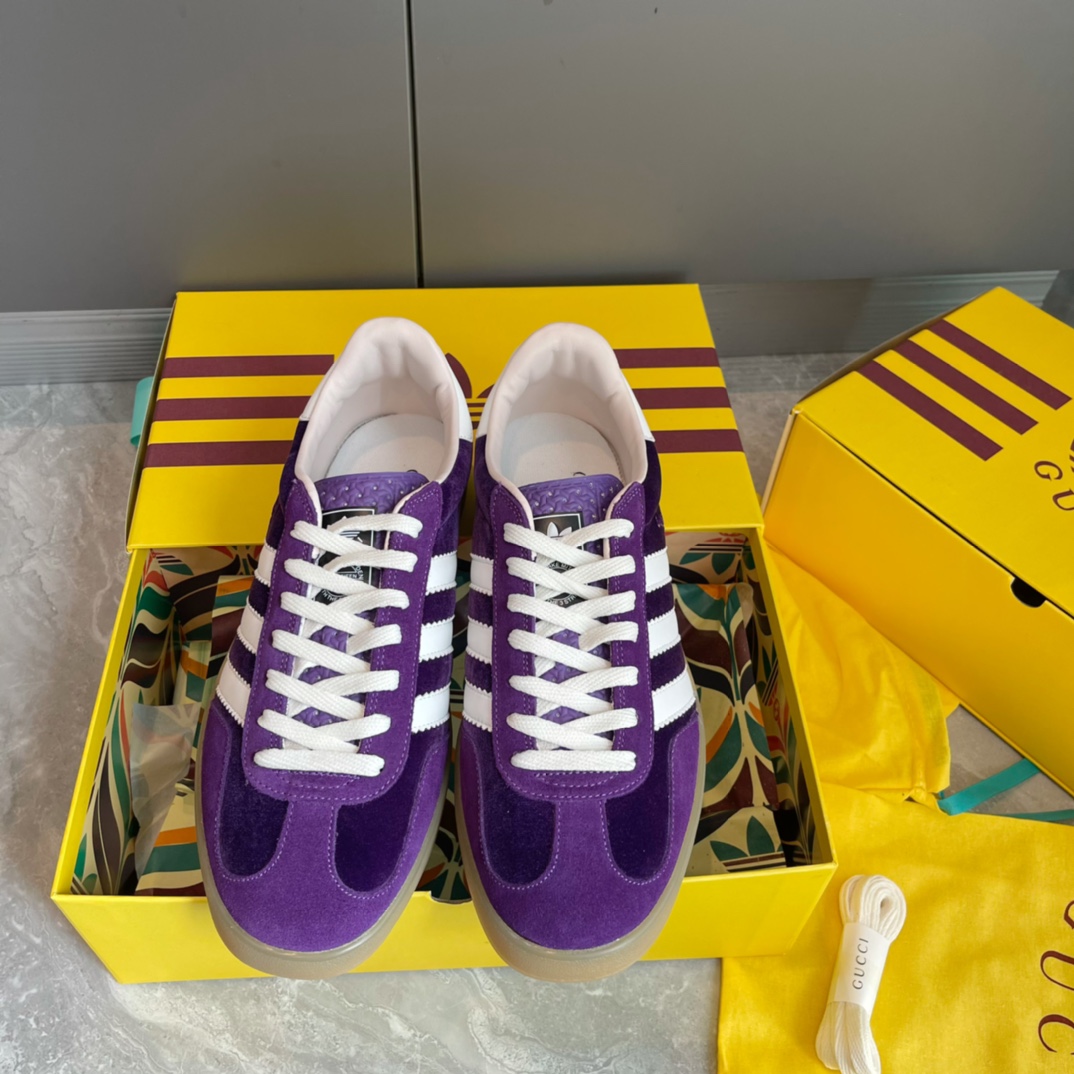 Gucci Adidas collaboration sneakers German army trainers purple suede three stripes