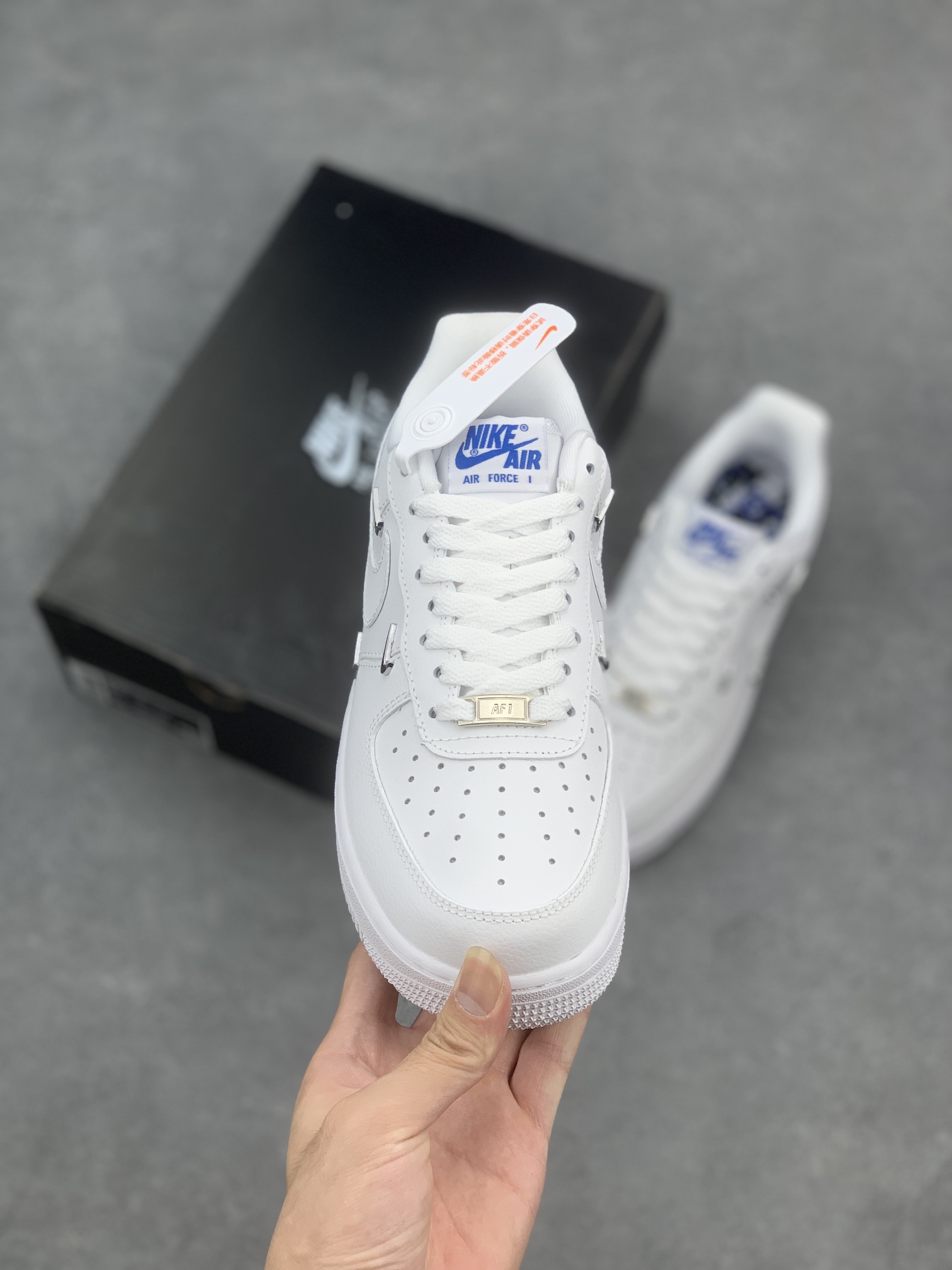 Nike Air Force 1 Low '07 All White with Mini Silver Swoosh Accents 3 i1660411280 7100 1