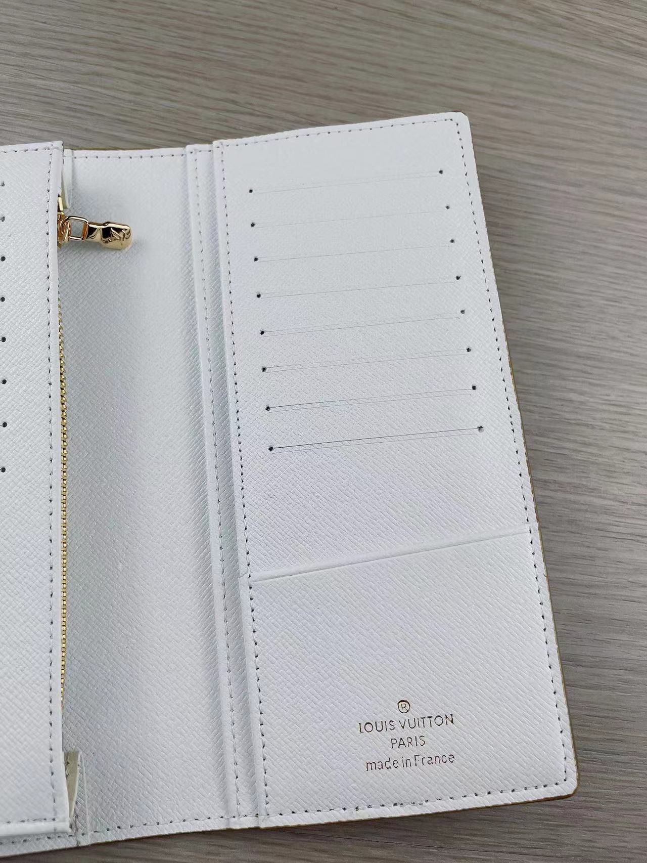 Close-up of bill compartment in a leather bifold wallet