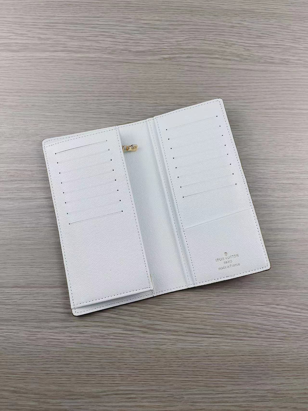 Close-up of card slots in a leather bifold wallet