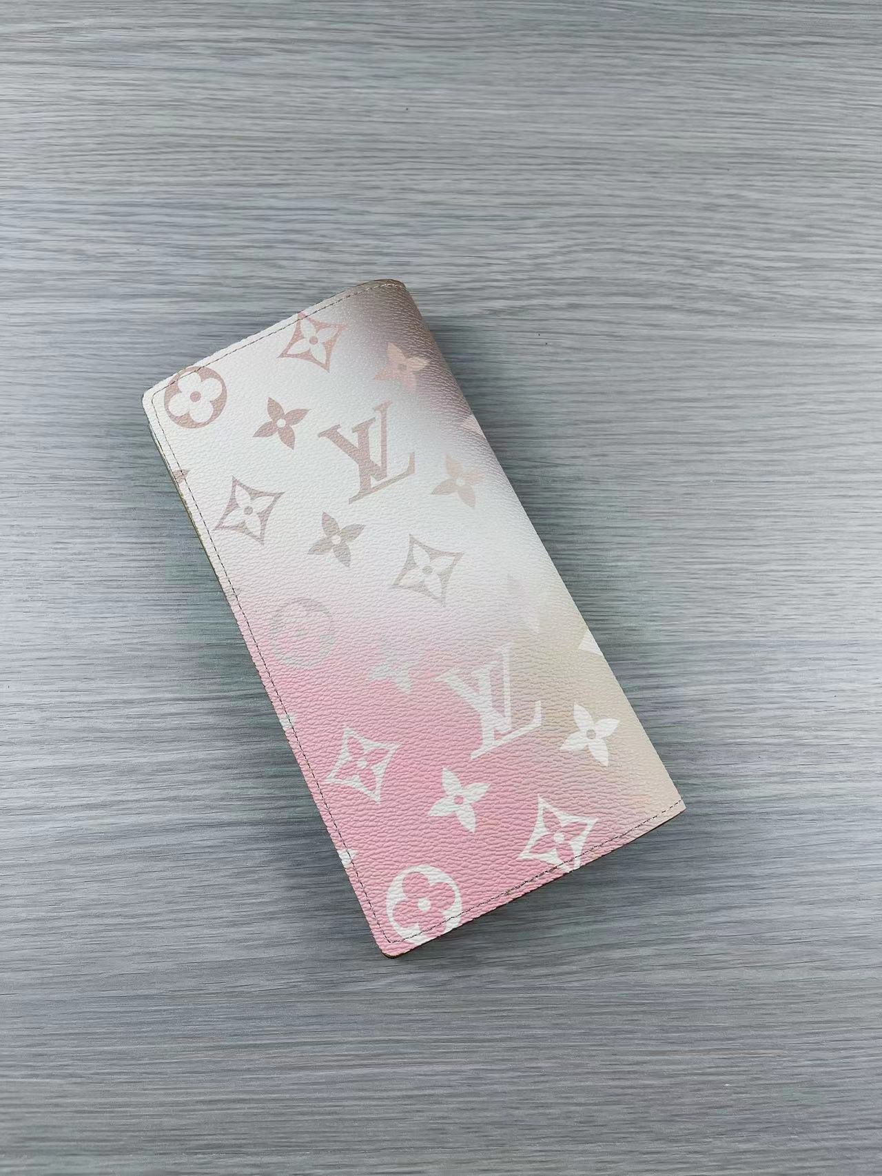 Open view of a genuine leather bifold wallet showing card slots and cash compartment