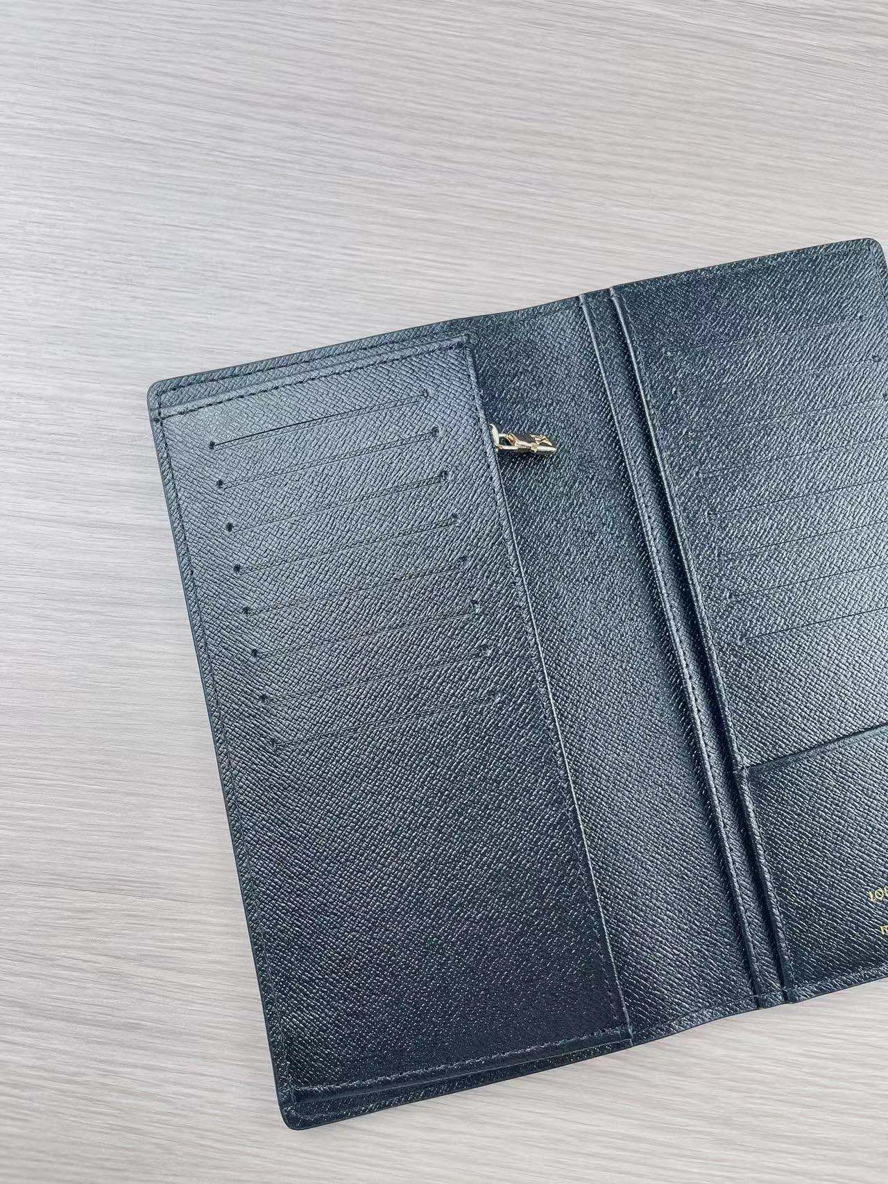 Leather bifold wallet at various angles.