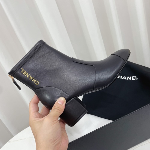 Chanel Women's Black Leather Ankle Boots with Block Heel and Logo Detail 1 Chanel Women's Black Leather Ankle Boots with Block Heel and Logo Detail