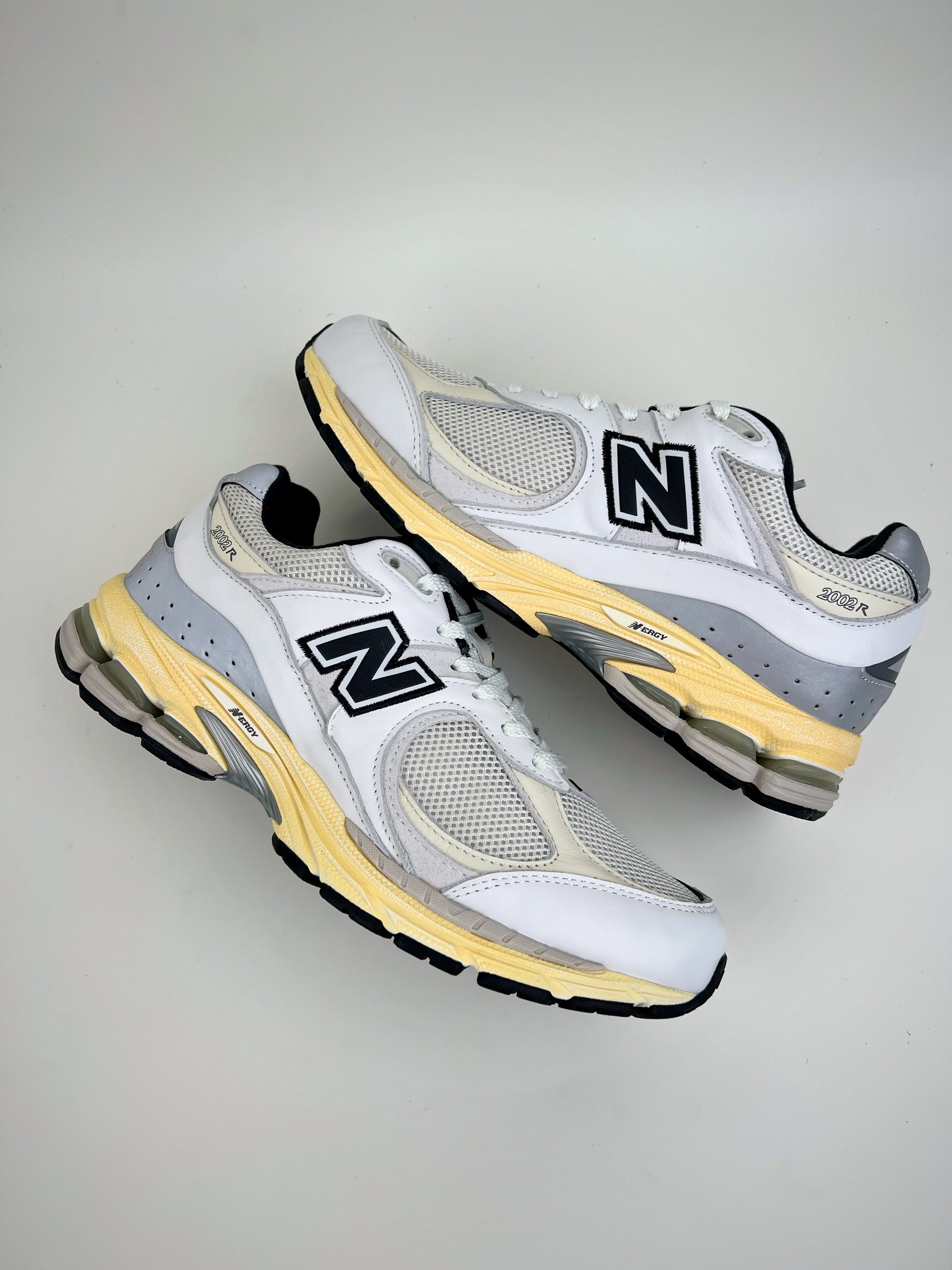 New Balance white and yellow 2002 series retro casual running shoes ML2002RT