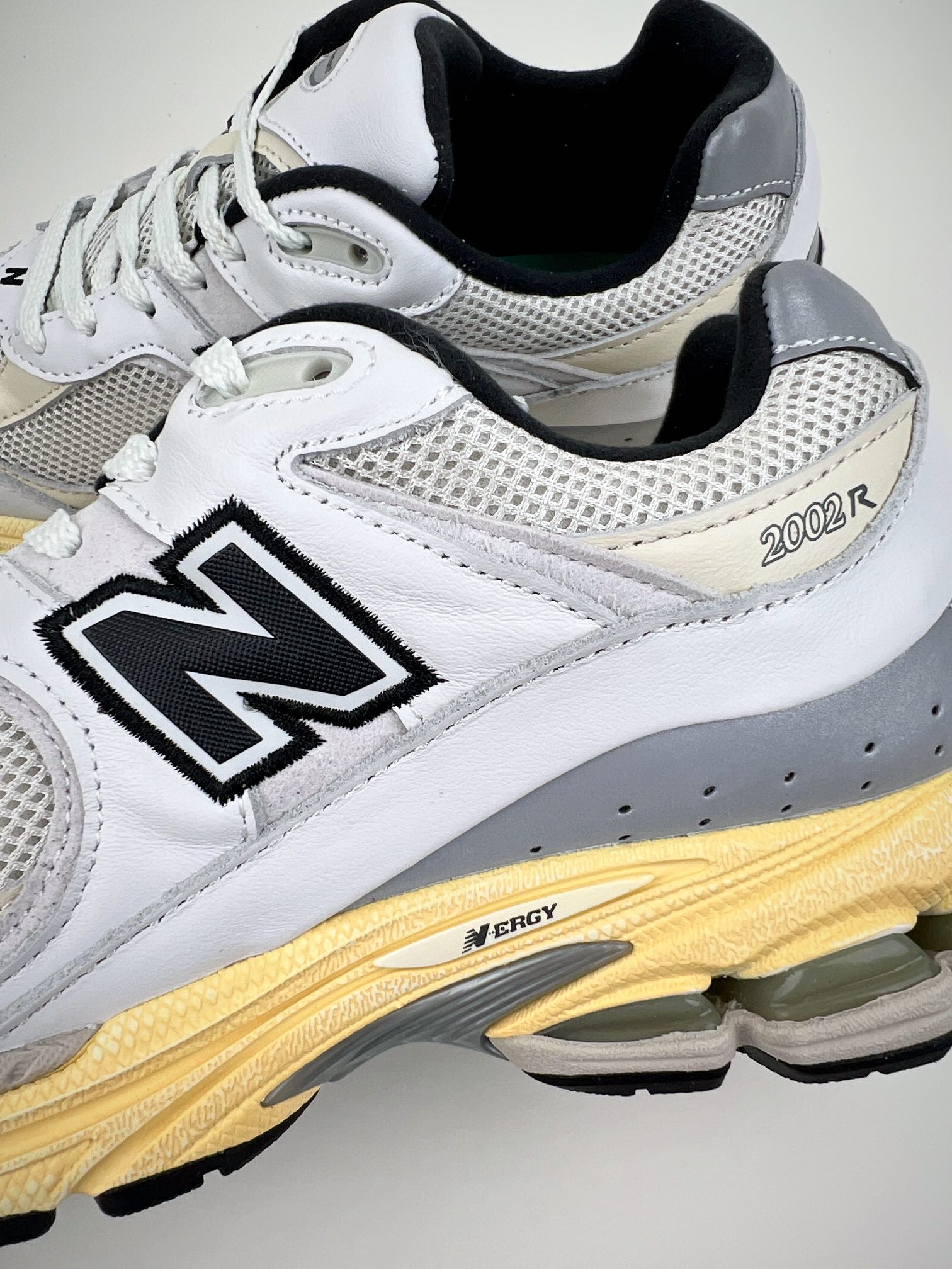 New Balance white and yellow 2002 series retro casual running shoes ML2002RT