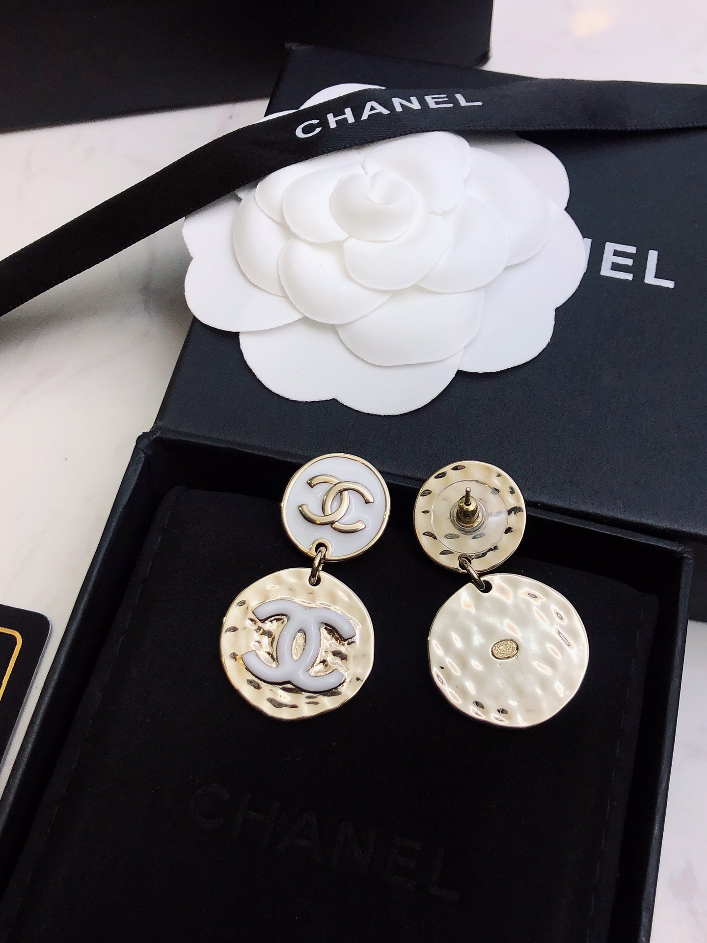 chanel silver round medallion earrings