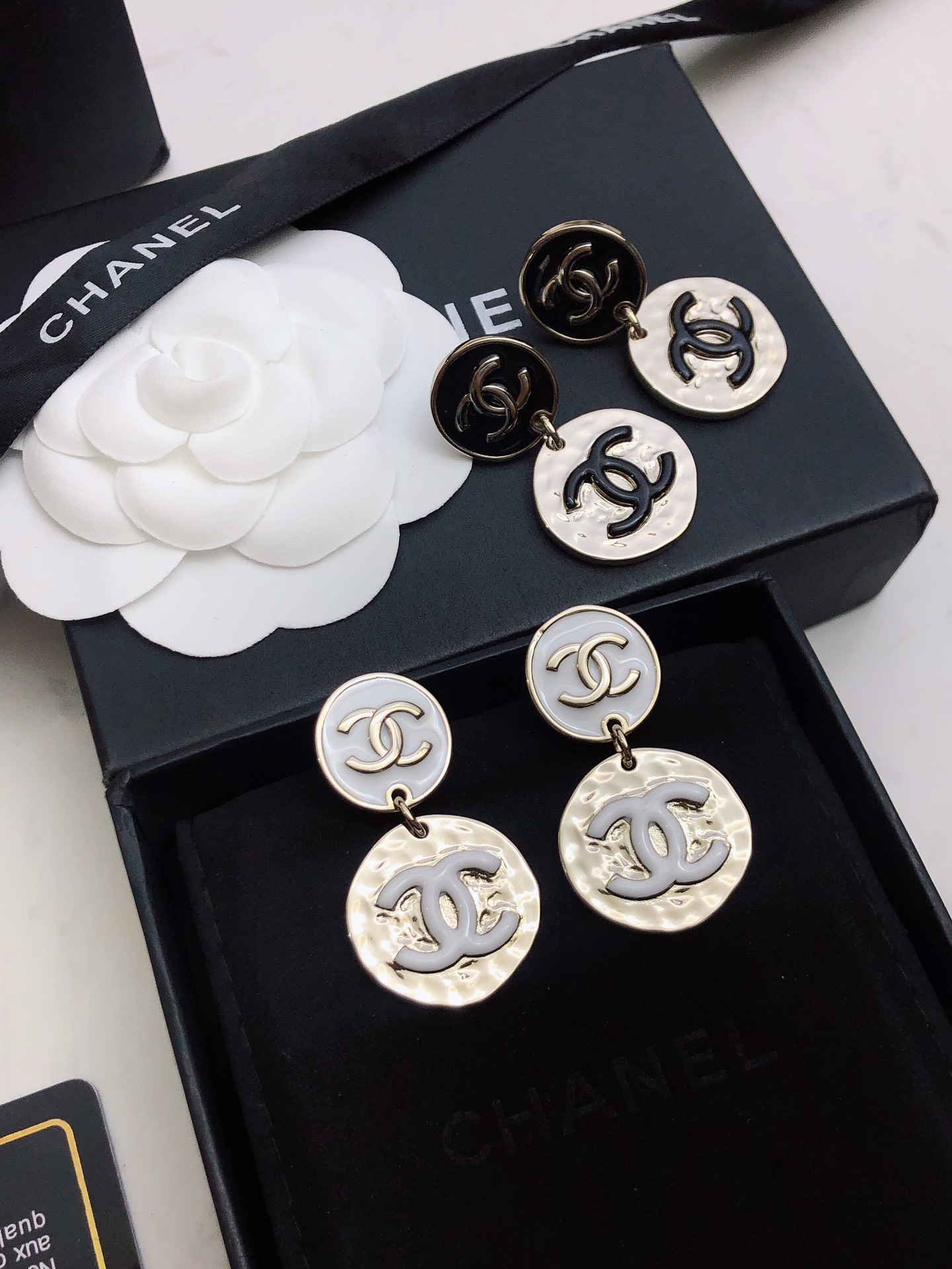 chanel silver round medallion earrings