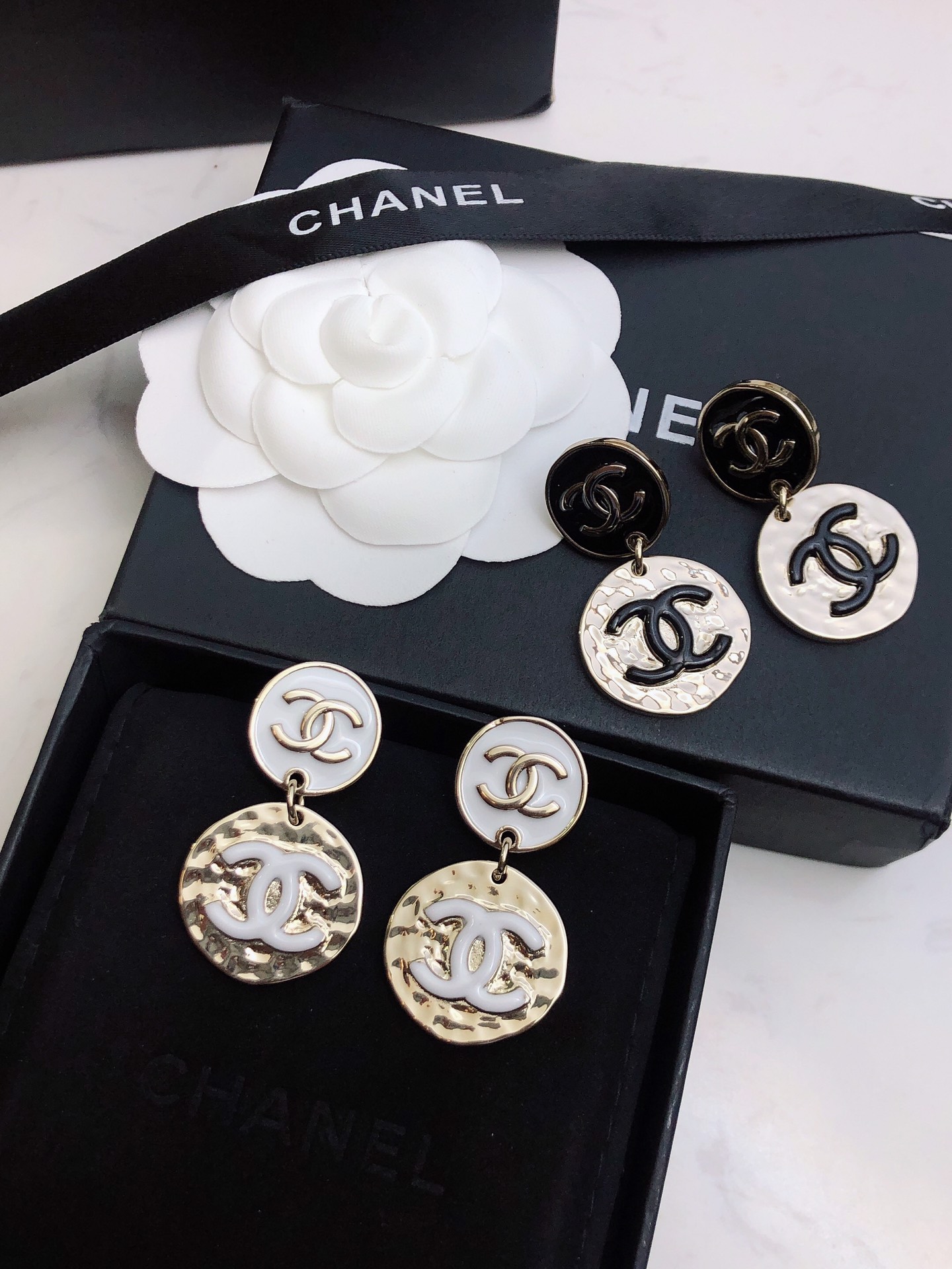 chanel silver round medallion earrings