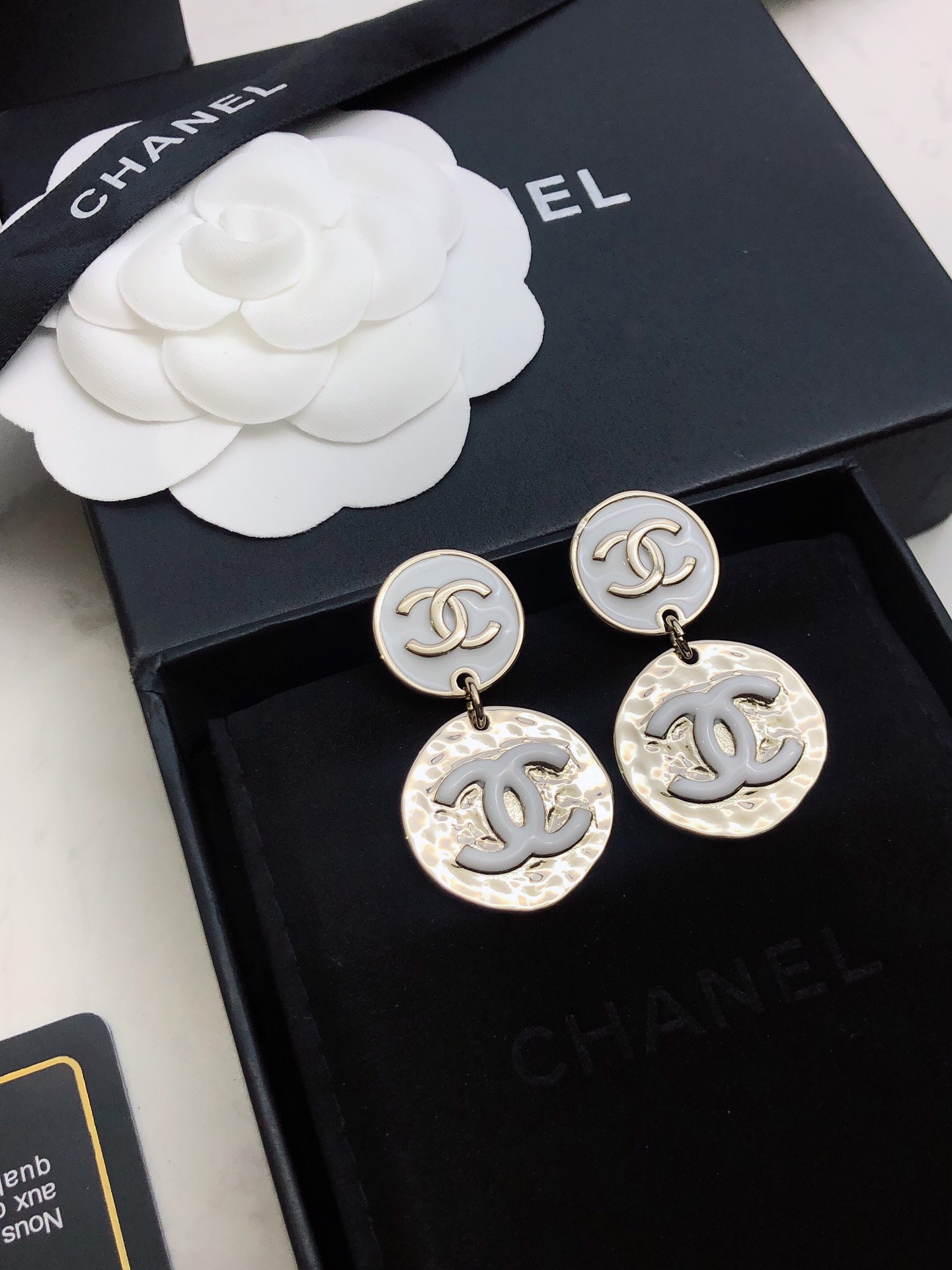 chanel silver round medallion earrings