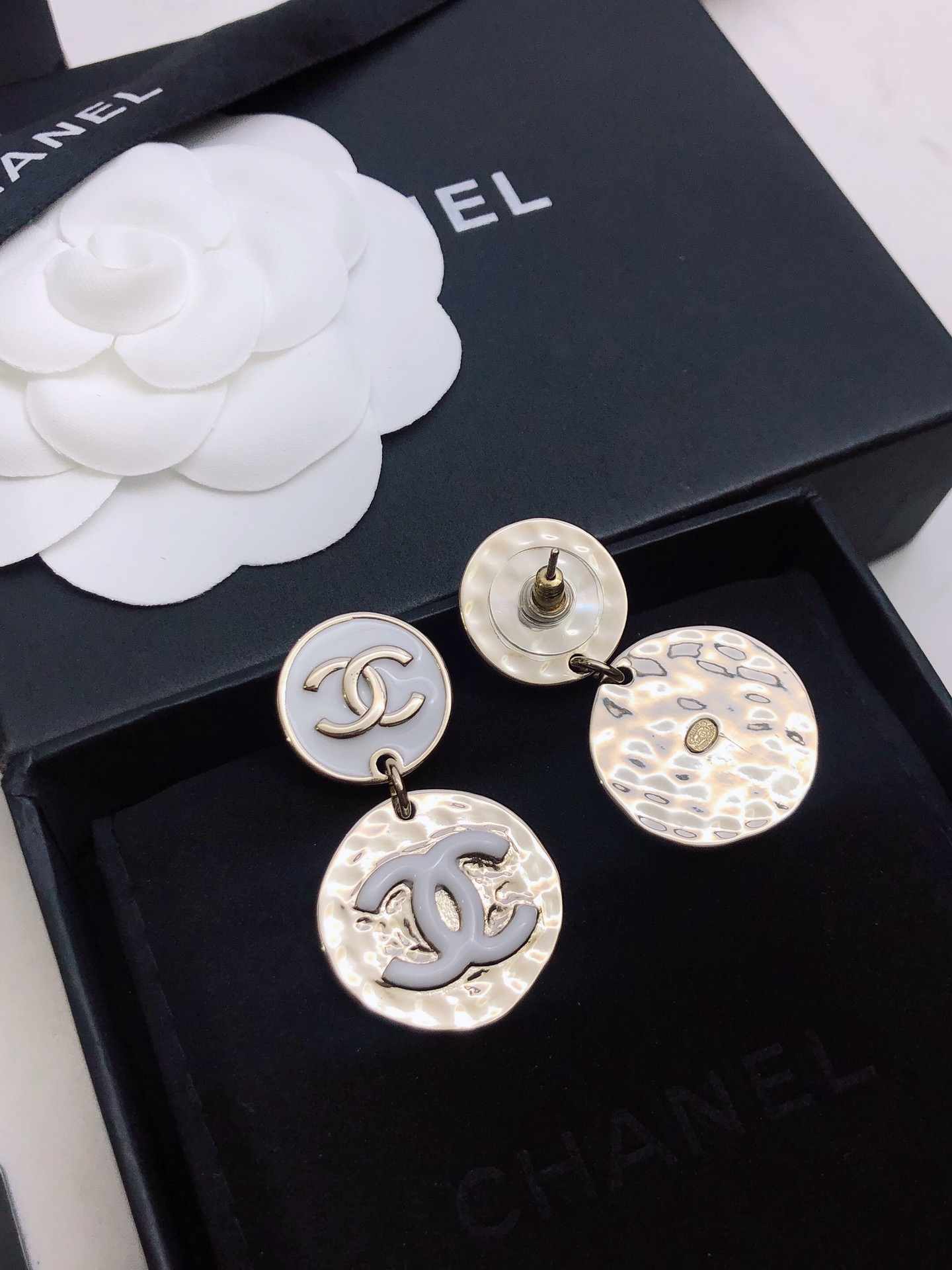 chanel silver round medallion earrings