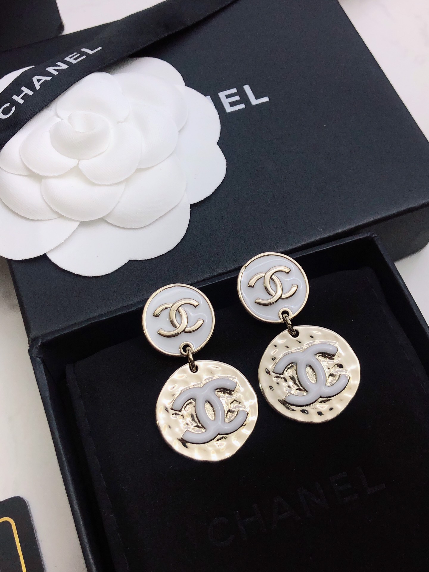 chanel silver round medallion earrings