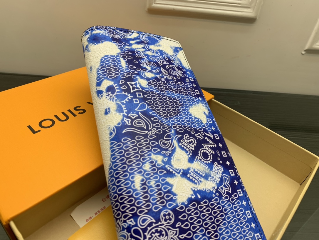 Side view showing slim profile of leather bifold wallet