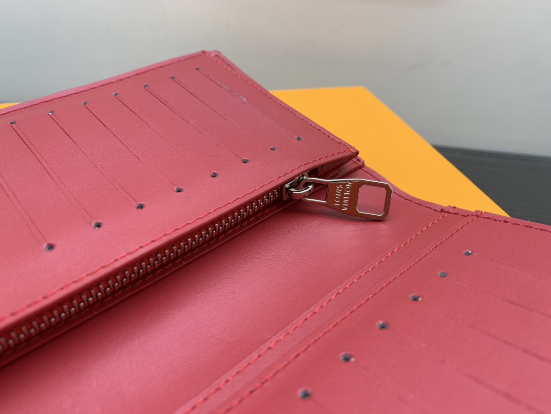 Man holding leather bifold wallet with RFID