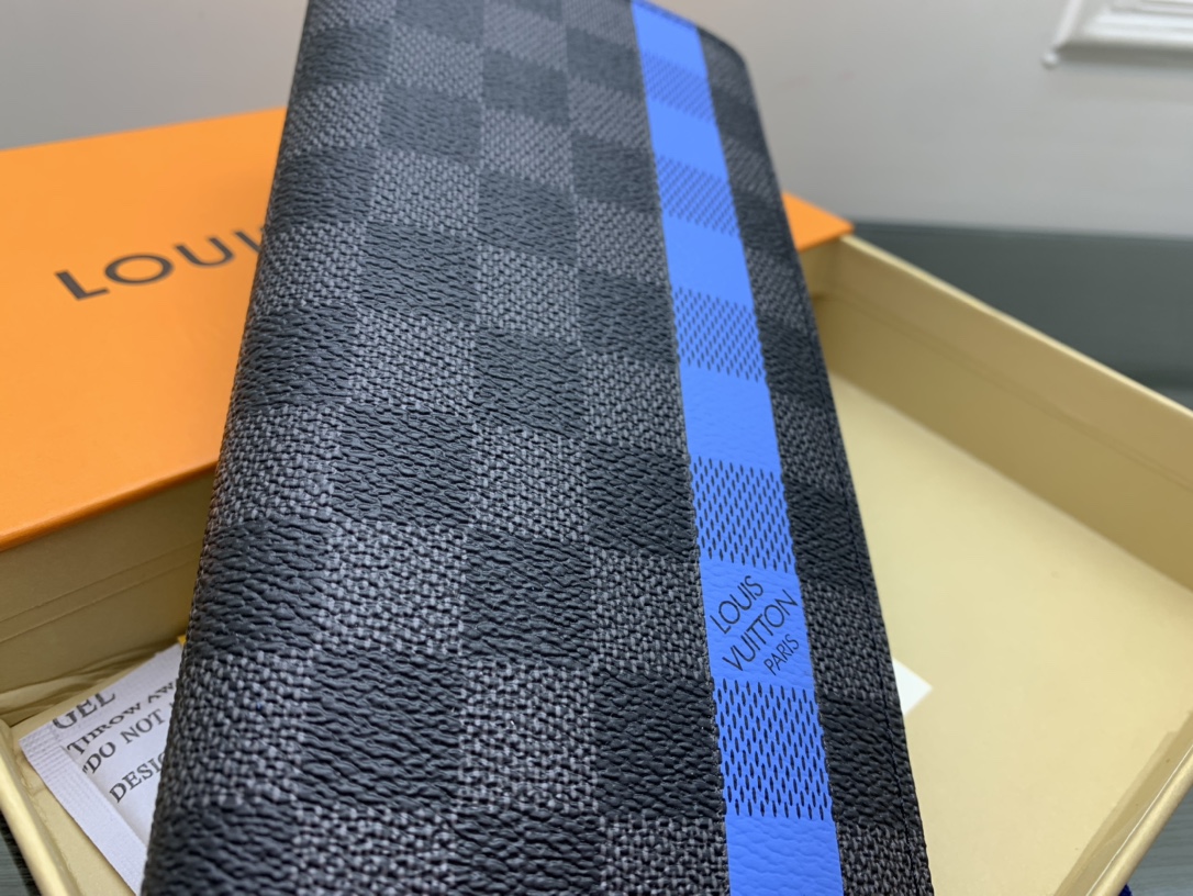 Side view of slim leather bifold wallet in pocket