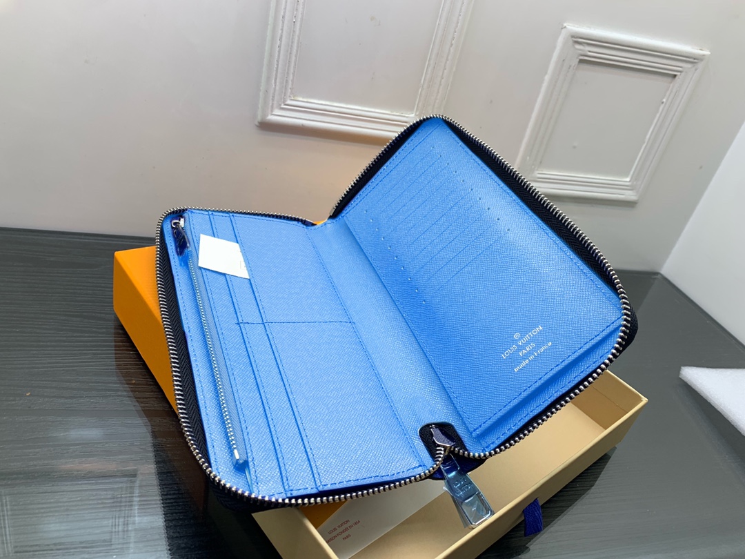 Leather wallet held in hand