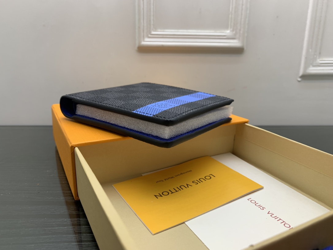 Leather bifold wallet in hand