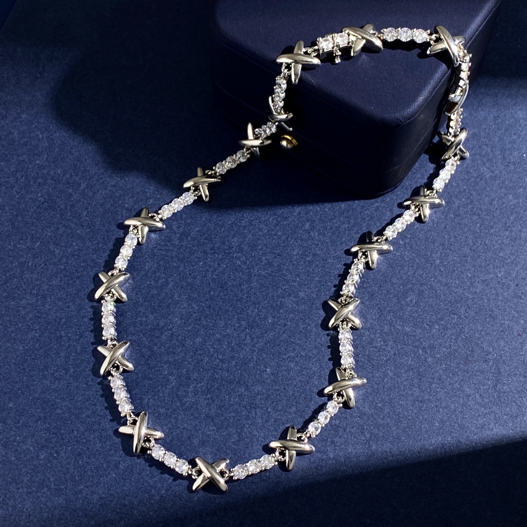 Tiffany X Signature Tennis Bracelet bracelet Gold-toned metal with clear round-cut gemstones Silver-toned metal with clear round-cut gemstones 7 inches