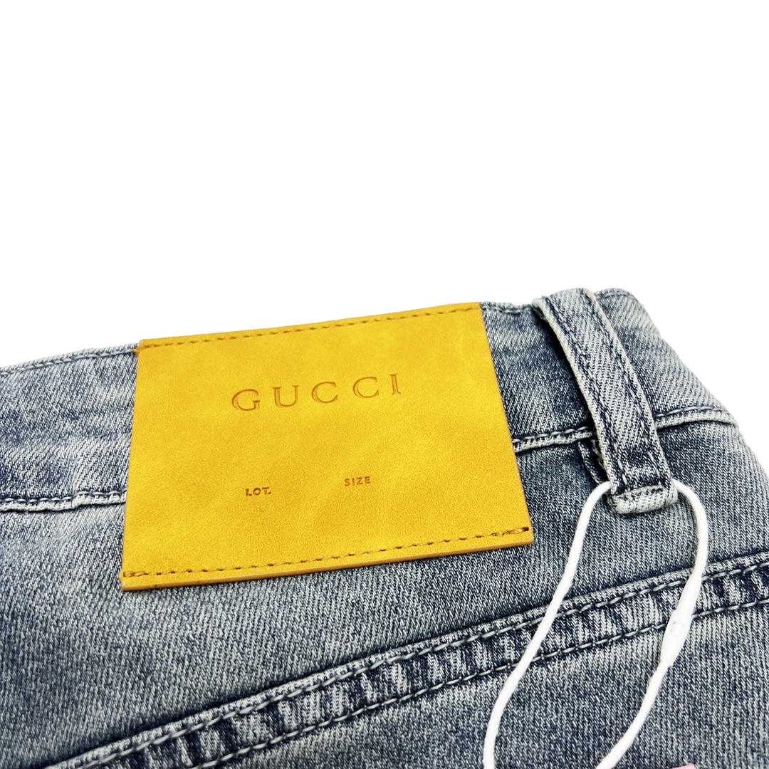 GUCCI/古驰 联名北面简约复古经典皮标LOGO牛仔裤