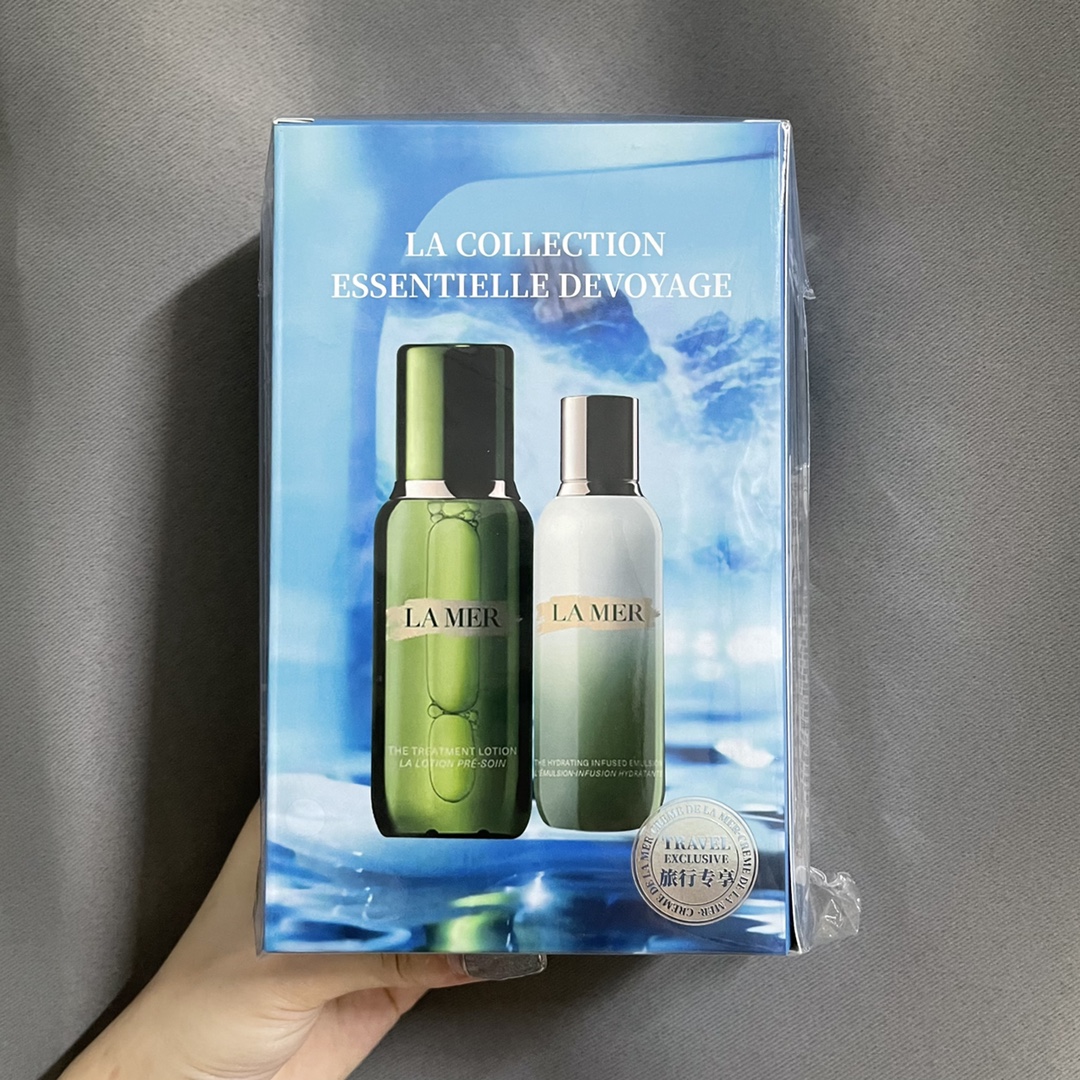 50! (Nota de pedido: set de loción y leche esencial) Set de dos piezas de loción y leche esencial de La Mer de tamaño c…