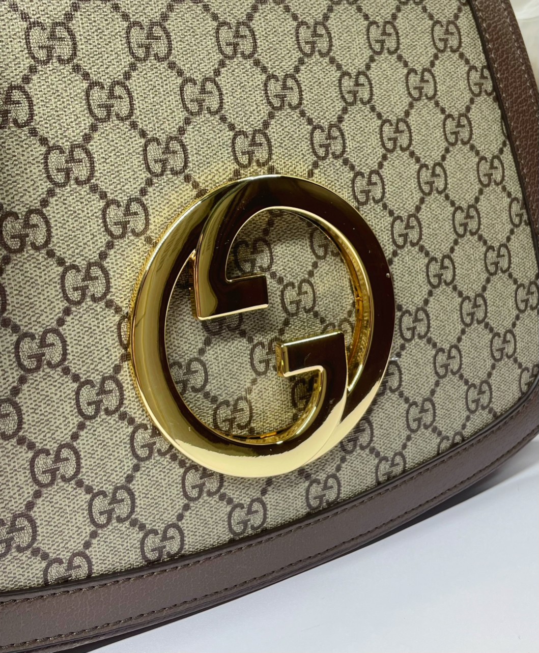 グッチ 中号肩背包 圆形デザインと双Gロゴの魅力