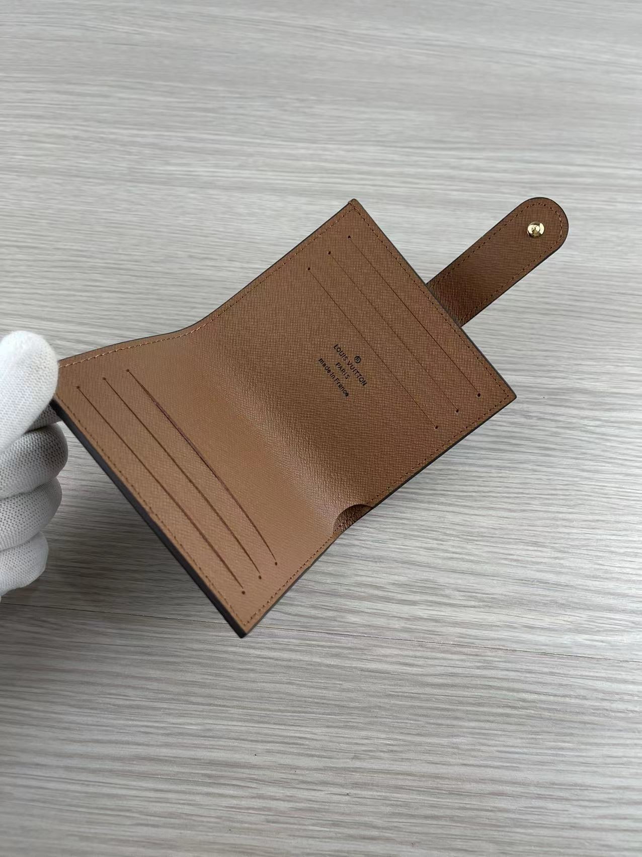 Side profile of slim leather card holder