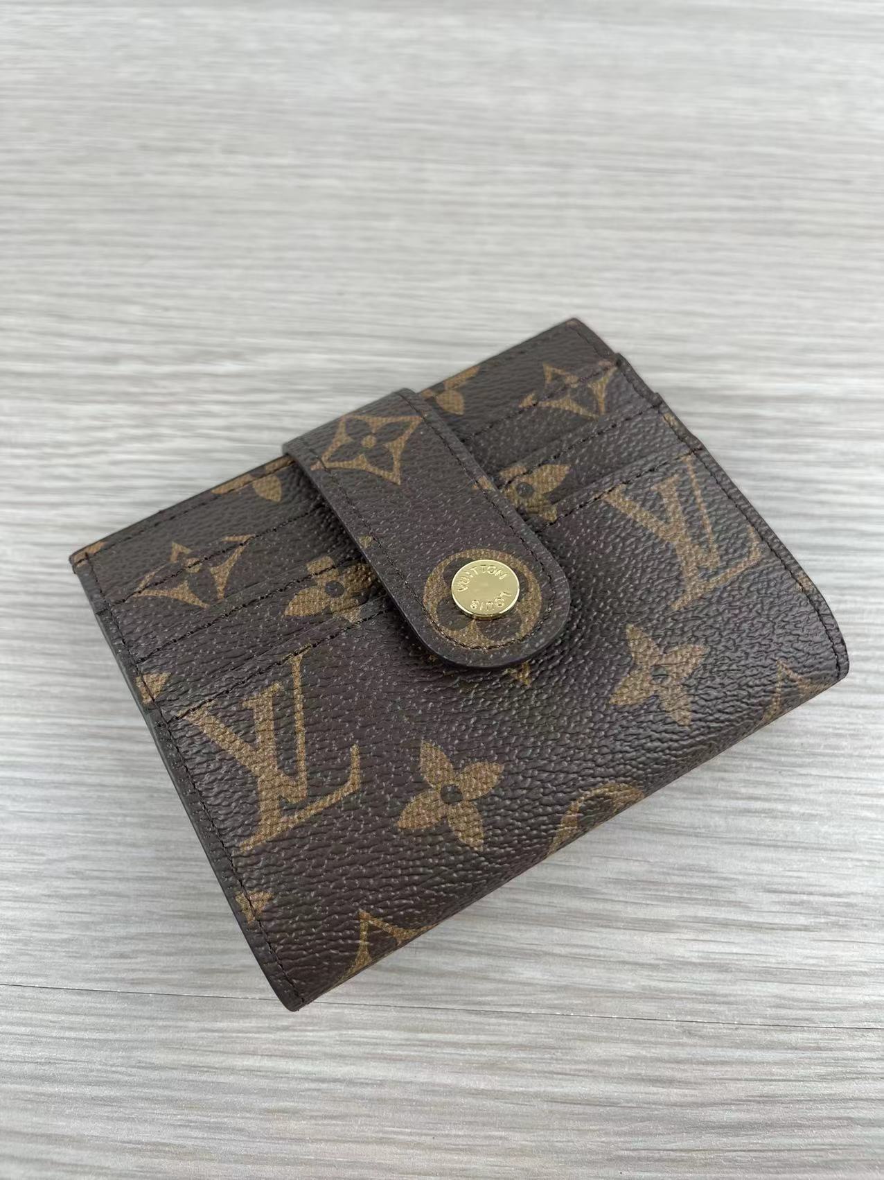 Open view of premium leather card holder with card slots