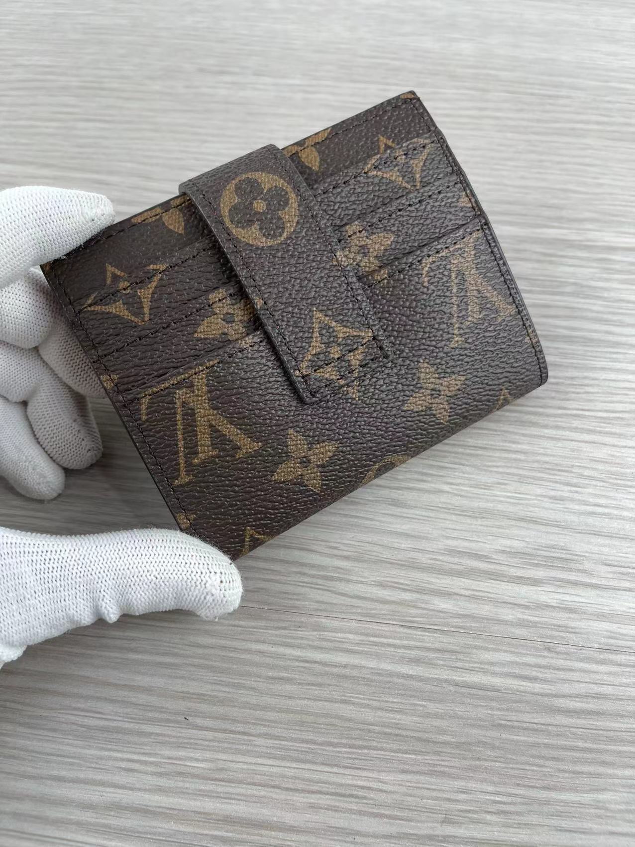 Close-up of leather texture on pink card holder