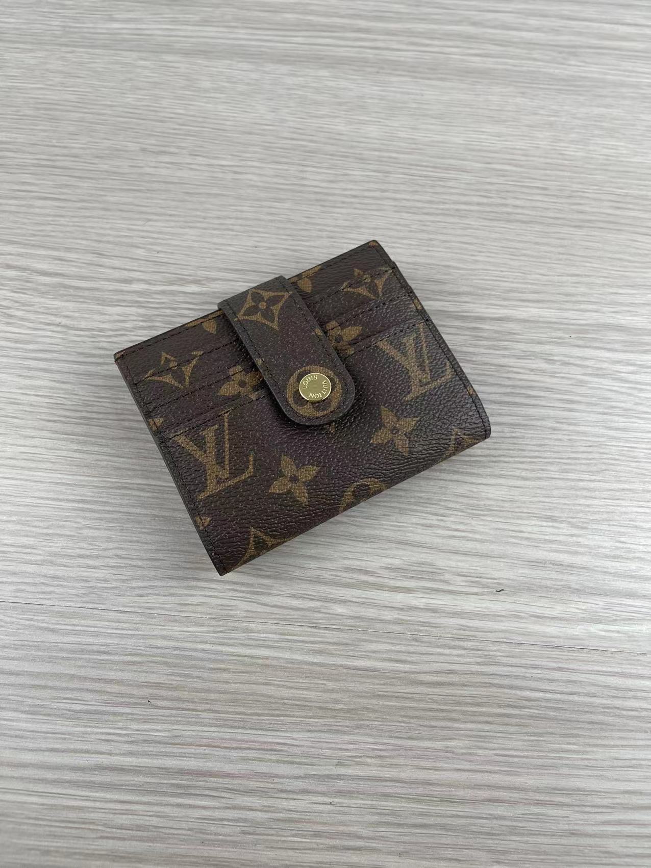 Front view of pink leather card holder