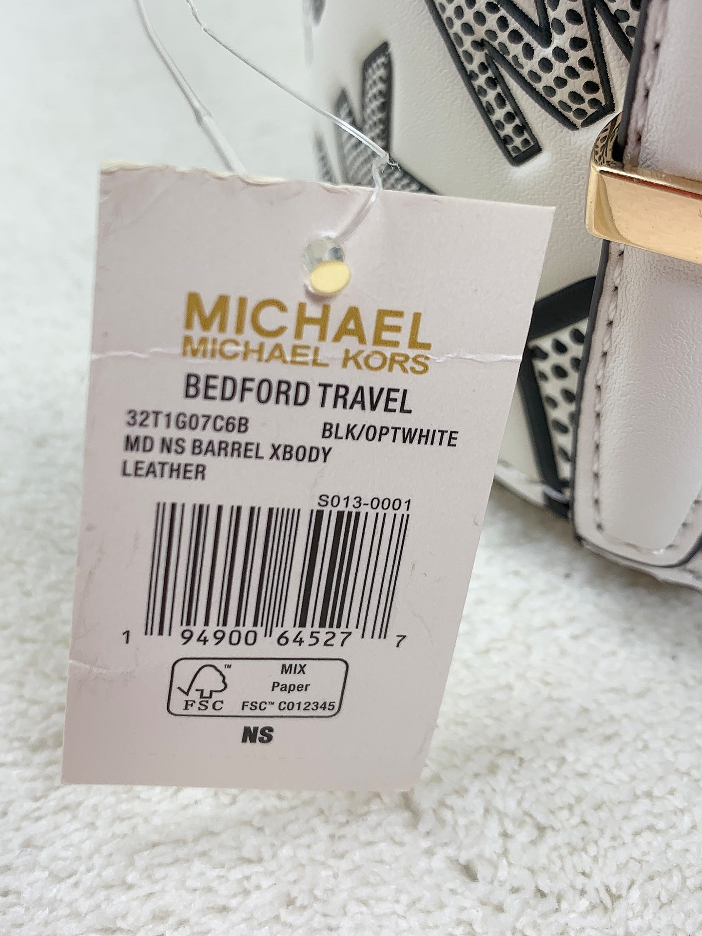 Michael Kors ～此款小圆筒黑白涂鸦手提斜挎包造型特别独特