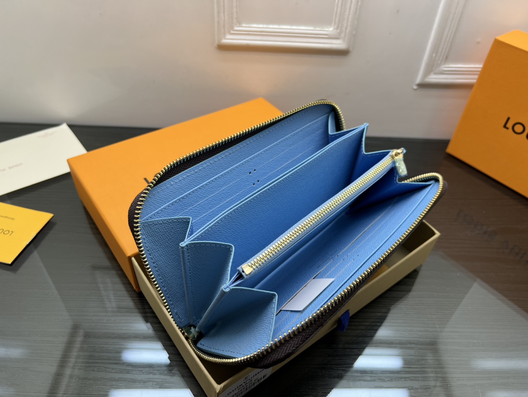 Leather wallet filled with cards and cash