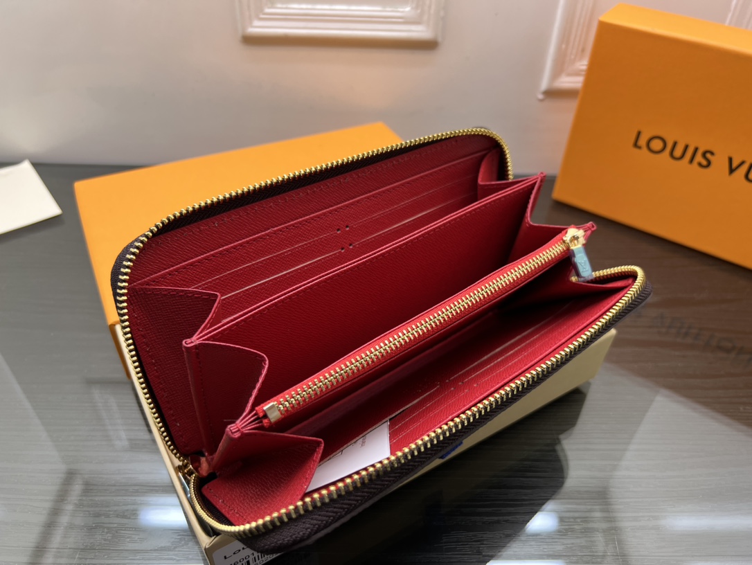 Leather clutch wallet showing phone