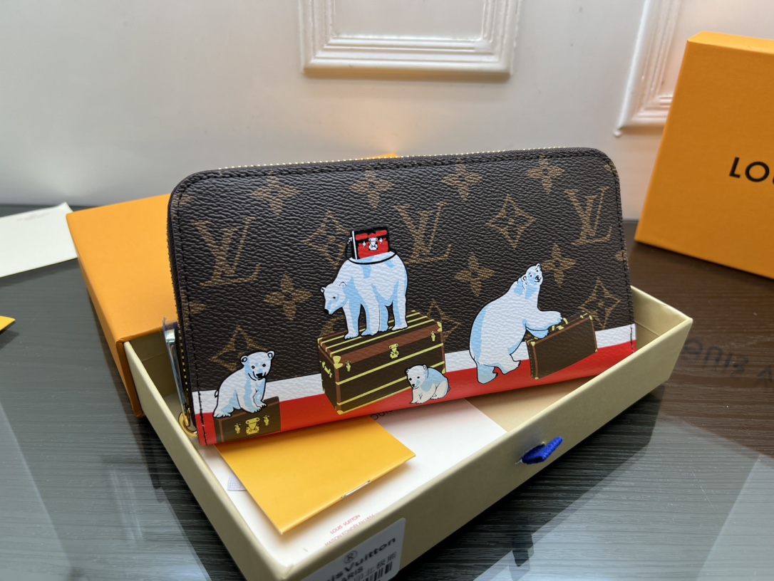 Leather clutch wallet holding a phone