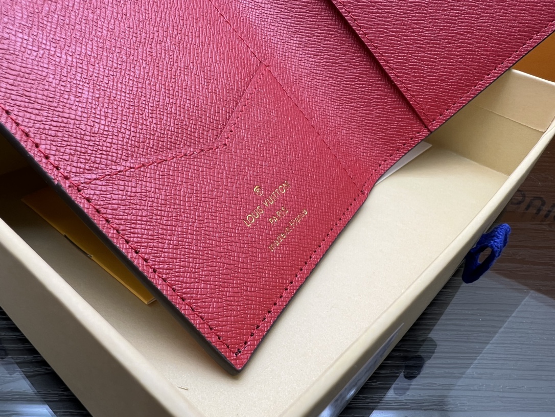 Handmade leather passport holder with items