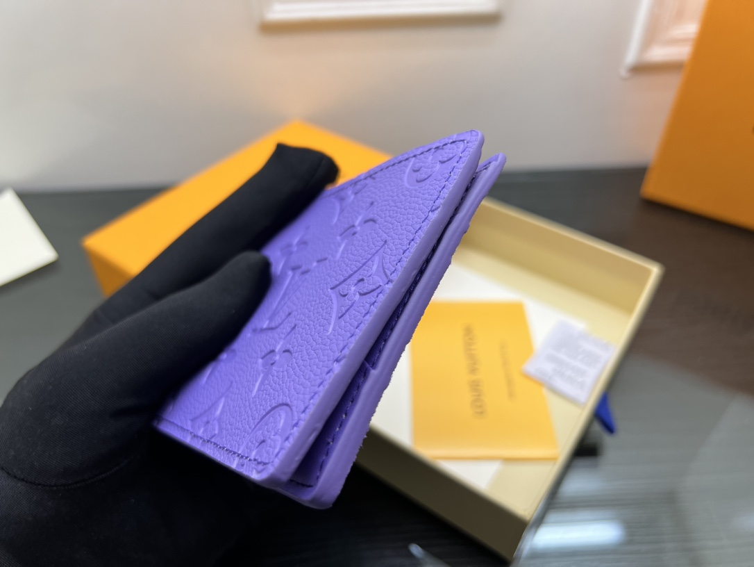 Minimalist leather bifold wallet in pocket