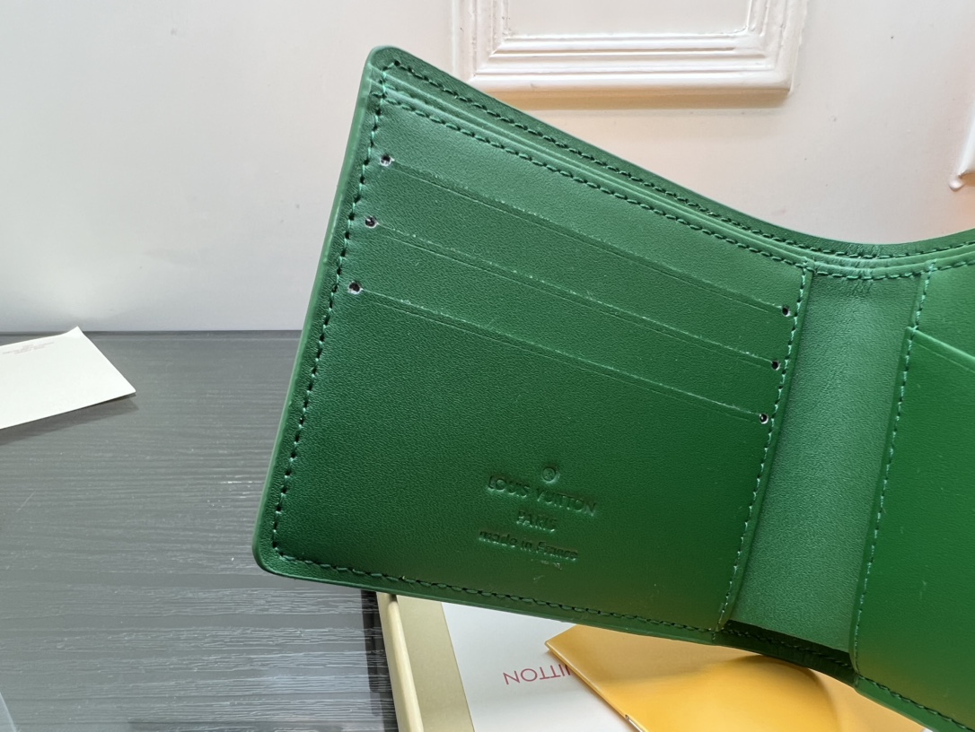 Leather wallet being held